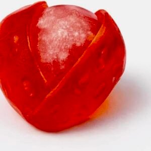 A 65g pack of Daffy’s Peel Me Strawberry Gummy Candy, showing the red peelable fruit gummies made with real juice.