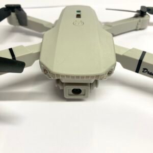 Top-down view of a gray quadcopter drone with rotating propellers and glowing blue LED indicator lights.