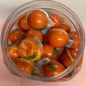A bulk collection of 50 individually wrapped halal 18g Orange Jelly Filled Gummies with a bright orange chewy exterior and zesty liquid center.