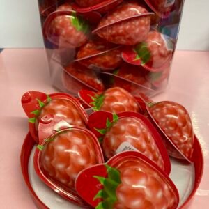 A bulk container of 50 individually wrapped halal 18g Raspberry Jelly Filled Gummies with a pink chewy exterior and liquid fruit center.