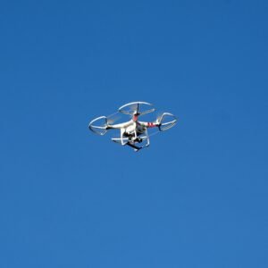A sleek 6-channel remote control quadcopter drone featuring 2.4GHz technology, 6-axis gyro stabilization, and bright LED lights for night flight.