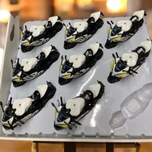 A realistic white and blue alloy police motorcycle toy with "Police" decals, featuring pressure-activated LED lights, siren sounds, and a pull-back rebound motor.