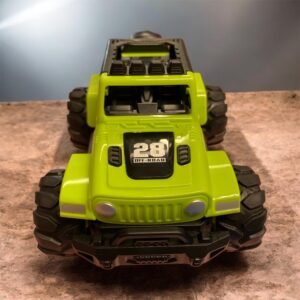 A teal and orange inertia-powered off-road toy car with large black textured tires and a sleek, rugged body design for kids aged 3 and up.