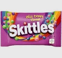 A 45g bag of Skittles Wild Berry showing the purple packaging and colorful berry-flavored chewy candies.